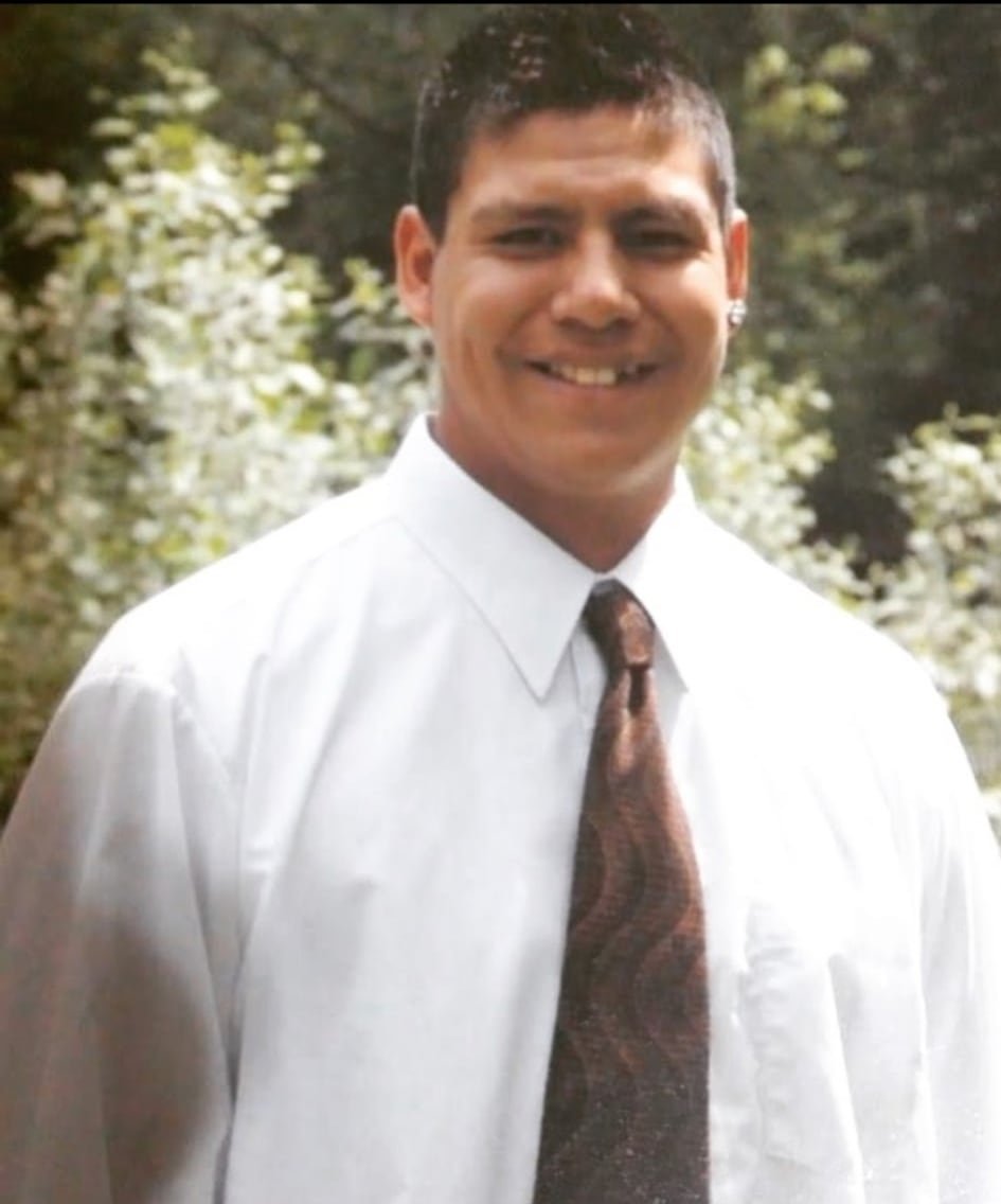 A man in a white shirt and tie