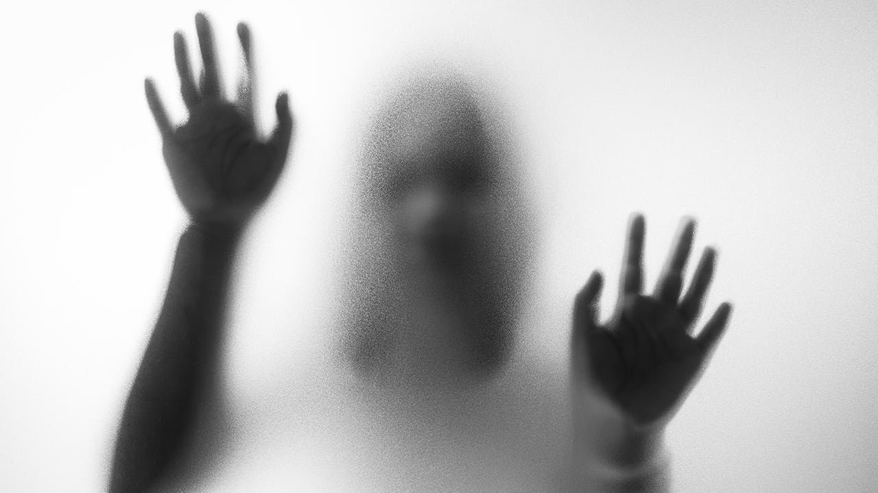 default-1121 Blurry hands and body figure abstraction resembling a ghost behind a glass pane with hands on it